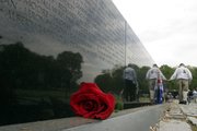 A single rose sits along the Vietnam Veterans Memorial in Washington, D.C. The memorial was one of several stops for Kansas veterans during an April 30 Honor Flight to the nation’s capital.