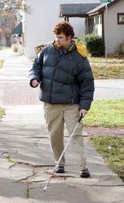 Greg Rogers uses his cane, his ears and his memory to navigate around Baldwin City and the Baker University campus.