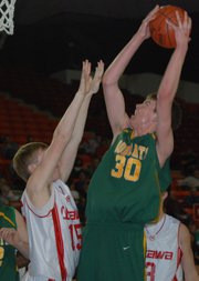 Basehor-Linwood freshman Ryan Murphy scores from close range during the first half of Basehor's 65-50 victory over Ottawa in the Class 4A state semifinals.
