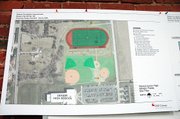 Architect's sketches of the new practice track and field facility north of Baldwin High School. The BHS soccer field will fit inside the track.