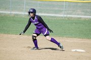 Baldwin High School freshman Kaysha Green heads for third base during the Bulldogs' win over Wellsville.
