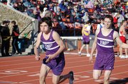 Baldwin High School freshman Tosh Mihesuah, left, begins his leg of the boys' 3,200-meter run Friday after taking the baton from sophomore Carson Barnes.