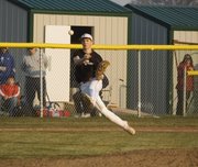 Ethan Lorance, Tonganoxie third baseman, throws to first for an out in the Chieftains' 8-7 victory over Jeff West on April 7.