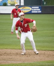 Tonganoxie third baseman Ethan Lorance prepares to gun a throw to first at CommunityAmerica Ballpark.