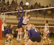 Brooklyn Kerbaugh gets up for a kill against Baldwin on Wednesday night during Tonganoxie's season-opening victory.