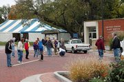 The yearly ritual of turning downtown Baldwin City into the Maple Leaf Festival stage was in full swing this morning, as the middle of High Street was being marked for where booths will go. Helping out this year was the First United Methodist Church youth group. City crews blocked off the area so the work could be done.