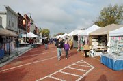 The sun was shining early for the Maple Leaf Festival Saturday as the crowds started to filter in on High Street in downtown Baldwin City. There are plenty of clouds around, too, and it's a bit cool. The grand parade starts at 11 a.m. and the kiddie parade is prior to it at 10:45 a.m.