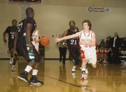 Jeremy Carlisle makes a pass in transition during the Chieftains' 61-44 win in the opening round of the Cardinal Invitational.