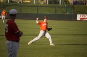 Braves shortstop Dalton Vitt prepares to throw after fielding a grounder in his team's 7-4 loss to Tonganoxie in the consolation semifinals of the Butch Foster Memorial Baseball Classic on Friday in Kansas City, Kan.