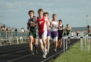 Matt Briggs moves ahead of the pack while competing in the 1,600-meter run at the De Soto Invitational on Friday. Briggs finished third in the race.