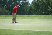 Tonganoxie High golfer Colby Yates rolls a putt toward the hole on May 24 at the Class 4A state golf tournament, played at Hesston Golf Park. Yates finished second with a 75, helping THS take fourth place in the team standings.