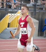 Jake Willis heads toward the end of his leg of the 4x400 relay for Tonganoxie on Saturday at state track. The Chieeftains finished third in Class 4A.