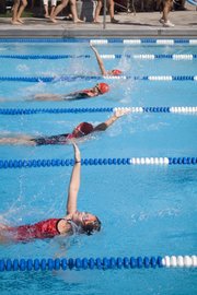 Four Tongie Tidal Waves girls were the only swimmers in their age group competing in the backstroke.