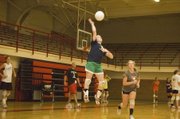 Megan Hummelgaard gets up in the air to send a shot back across the net on Wednesday at Tonganoxie volleyball camp.