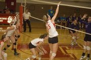 Brooklyn Kerbaugh sends the ball over the net for Tonganoxie in the team's home loss to Baldwin on Thursday.