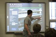 Alex Whitten, Eudora High junior, demonstrates KDOT's new Airspace Awareness Tool, which helps people figure out if structures such as wind turbines will interfere with airspace. The program is the first of its kind in the country.
