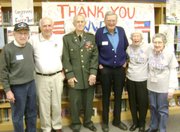 Pictured, from left to right: Maury Dubinsky, Overland Park, Navy fighter pilot off USS Intrepid; Ed Boswell, Prairie Village, Marine rifleman at Iwo Jima; Norman Hudson, Lenexa, Army communications officer, Pacific Island
invasions; Bill McCune, Prairie Village, Navy crew member in Pacific Island invasions; Virginia Summers, Lenexa, Army nurse in New Guinea, Philippines hospitals; and Margaret Davisson, Lenexa, Army dietician in Field Hospital in France