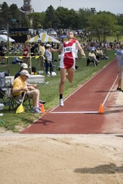 Before winning a state championship in the high jump Friday at Wichita, THS sophomore Jenny Whitledge competed in the long jump and finished 10th.