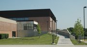 Members of Shawnee Mission Northwest's PTSA and community volunteers installed more than 50 plants along the school's west entrance last month.