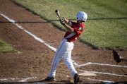 Austin Harkrader strokes a double down the left-field line in the first inning of Tonganoxie's 9-8 zone tournament loss to the Kansas City Cyclones on Monday at Eisenhower Park in Kansas City, Kan.
