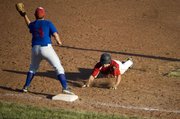 Dylan Puhr slides safely into third base for a triple in the fifth inning of Tonganoxie's season-ending loss to Wellsville at the Class AA Zone 2 tournament on July 19 in Kansas City, Kan.