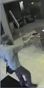Authorities are looking for this man, captured on surveillance tape July 25 while robbing the Bank of Blue Valley, 5520 Hedge Lane Terrace in Shawnee.