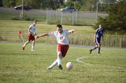 Tonganoxie junior Jared Colgrove moves the ball up the field in the second half of the Chieftains' 1-0 overtime victory against Piper on Wednesday.