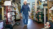 Evelyn VanKemseke, Shawnee Community Services founder and president, totes two bags of potatoes to the front of the store where clients could pick them up on Oct. 8. In recent weeks the charity has received 21,500 pounds of donated potatoes, with another 5,000 pounds expected to arrive Oct. 22.