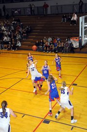 Baldwin High School sophomore Katie Jones attempts a shot as she fouled in the lane. The Bulldogs fell to the Chargers 47-39.