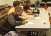 Four Bonner Springs football players signed letters of intent to continue their careers at respective community college programs. Daemon Franklin (Butler Community College), J.J. Jackson (Coffeyville Community College), Stevie Williams (Butler Community College) and JaVante Young (Fort Scott Community College) made their college choices official on Wednesday in front of parents, coaches and peers.