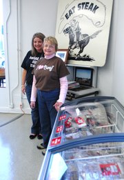 Dodge City Beef moved this month from 11115 Johnson Drive to a larger retail space a few doors down, inside the former Commerce Bank building at the corner of Johnson Drive and Nieman Road. Heidi Hullman-Davis (left), Olathe, manages the store. Her mother, LuAnn Hullman, Pratt, helped out on a recent afternoon. The store sells beef raised on the Hullman family ranch in Pratt.