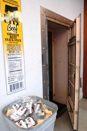 After scraping off dozens of layers of paint, this safe was ready to be re-purposed as a spot to display and sell spices and rubs at Dodge City Beef's new location, inside the former Commerce Bank Building at Johnson Drive and Nieman Road. The safe dates back to the Shawnee State Bank, which constructed the original part of the building in 1909.