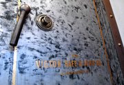 After scraping off dozens of layers of paint, this safe was ready to be re-purposed as a spot to display and sell spices and rubs at Dodge City Beef's new location, inside the former Commerce Bank Building at Johnson Drive and Nieman Road. The safe dates back to the Shawnee State Bank, which constructed the original part of the building in 1909.