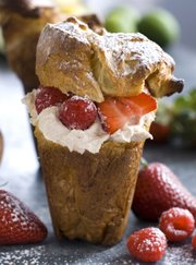 Cardamom popovers with cinnamon mascarpone and berries make for a quick and simple springtime dessert. The recipe also does double-duty — leftover popovers can be served the next morning with jam and butter for breakfast.