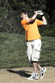 Bonner Springs junior Jason Van Maren works his way out of a sand pit on the back nine at the KVL tournament in Lawrence on Wednesday, May 9.
