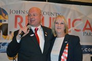 10th District State Senator Mary Pilcher-Cook, R-Shawnee, is congratulated on her re-election by Ronnie Metsker, chairman of the Johnson County Republican Party, during an election night watch party at the Doubletree Hotel in Overland Park.