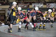 As this glmpse at a 2012 Victory Vixens bout shows, Kansas City Roller Warriors competition can get fierce.