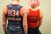 Tough-sounding Nicknames like those Strafuss and Roach sport on their uniforms are a roller derby tradition.