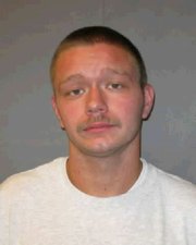 Kyle T. Flack, mugshot courtesy of Kansas Department of Corrections, was arrested Wednesday morning in connection with a triple homicide in Ottawa.