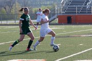 BSHS senior Jessica Moulin works the ball upfield during the Braves 3-1 loss against De Soto on senior night Monday.