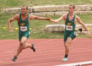 Basehor-Linwood's Trey Kincheloe hands off to Bryan Crowe in Friday's Class 4A boys 4x100-meter relay preliminaries in Wichita.