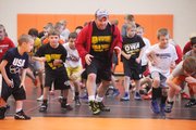 U.S. Olympian Ken Chertow leads a group of young wrestlers during a weeklong camp in May at SM Northwest.