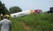 Another photo of the bus, lying on its side next to the ramp from southbound K-7 to K-32, from Jason Sheahan.