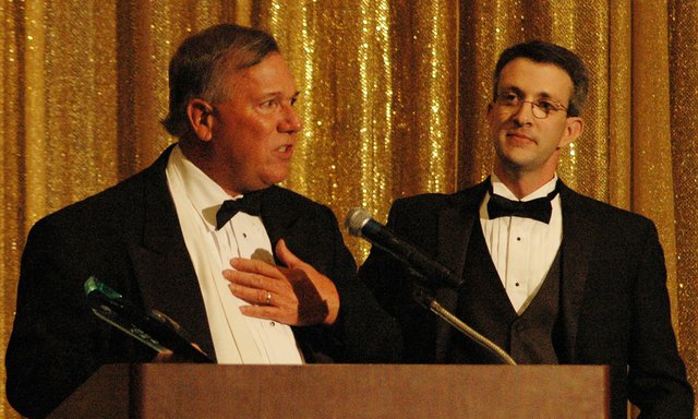 Paul Ridgway, left, thanks the chamber after being name the Shawnee Chamber of Commerce's "Citizen of the Year" by Justin Nichols during the annual chamber gala Saturday at the Sheraton Overland Park.