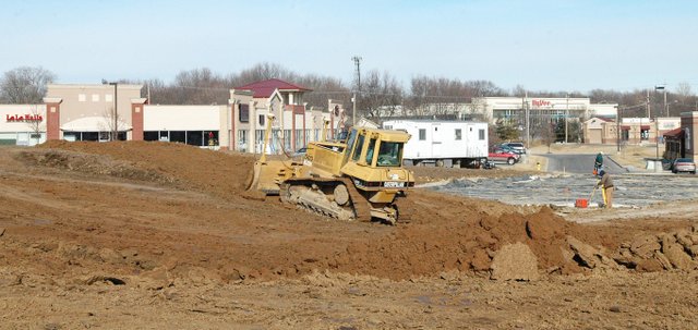 Crews are working to clear the lot at the corner of Shawnee Mission Parkway and Widmer Road to construct a Hy-Vee gas station.