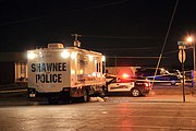 The Shawnee Police Department's mobile command center parked near the scene to give investigators a warm place to work.