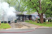 The home at 4829 Lucille in Shawnee was heavily damaged by fire Thursday morning.