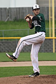 Blue Valley Southwest pitcher Andrew Gillett winds up for a pitch during the regional championship game.
