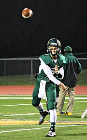 Justin Phillips threw two touchdown passes against Louisburg on Friday.