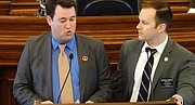 Rep. Brett Hildabrand, left, R-Shawnee, answers questions from Rep. Brandon Whipple, D-Wichita, about a resolution calling for a constitutional convention of the states to rein in the power of the federal government.